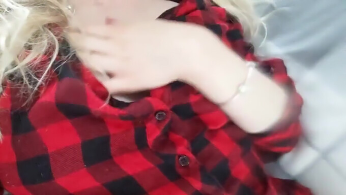 Aroused teenage girl in plaid shirt stimulates herself to orgasm