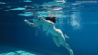 Sheril, A Russian Teen With Black Hair, Takes A Swim In The Pool